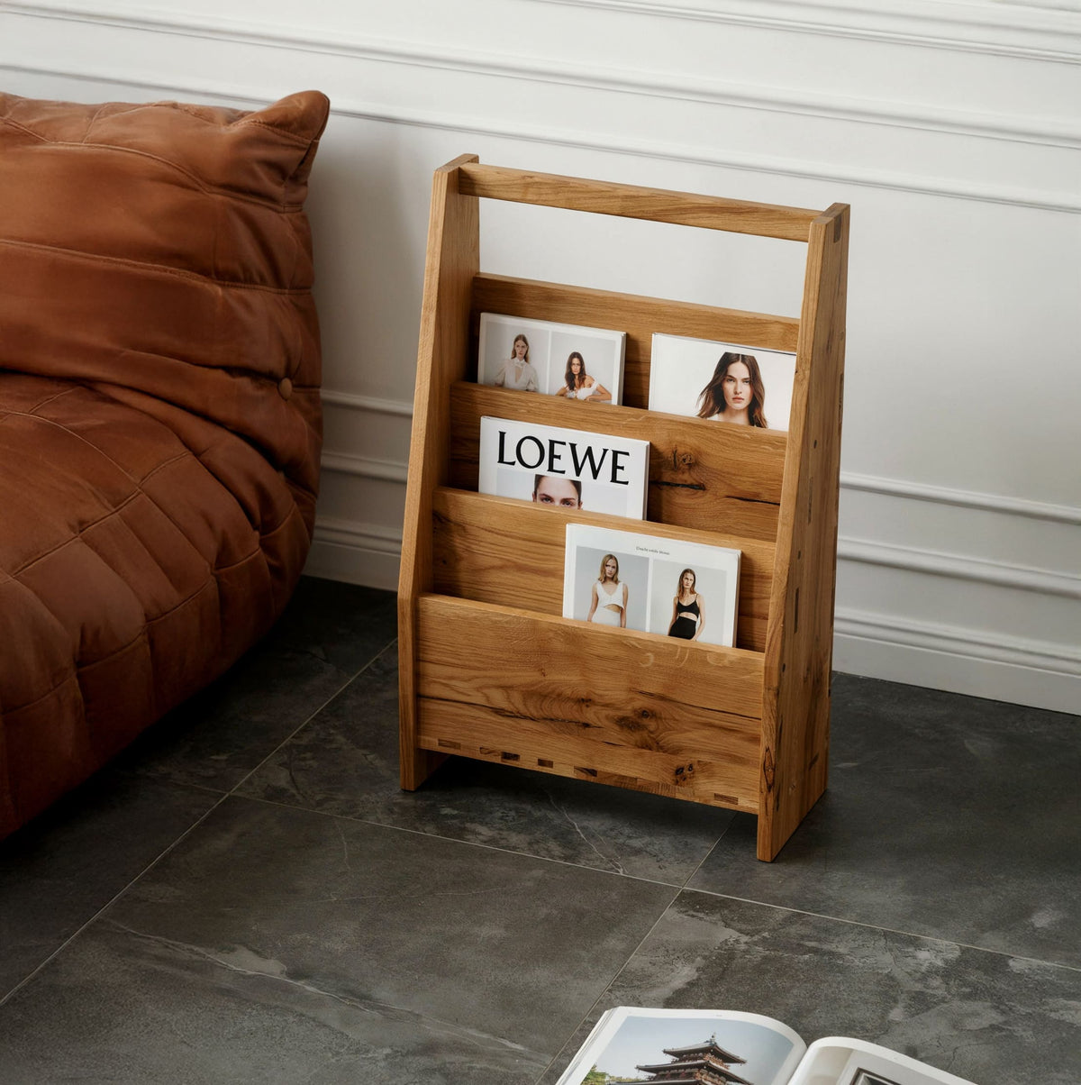 Contemporary solid wood magazine display stand displayed in a home office