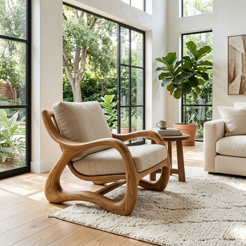 Sculptural solid timber armchair frame with flowing ribbon armrests