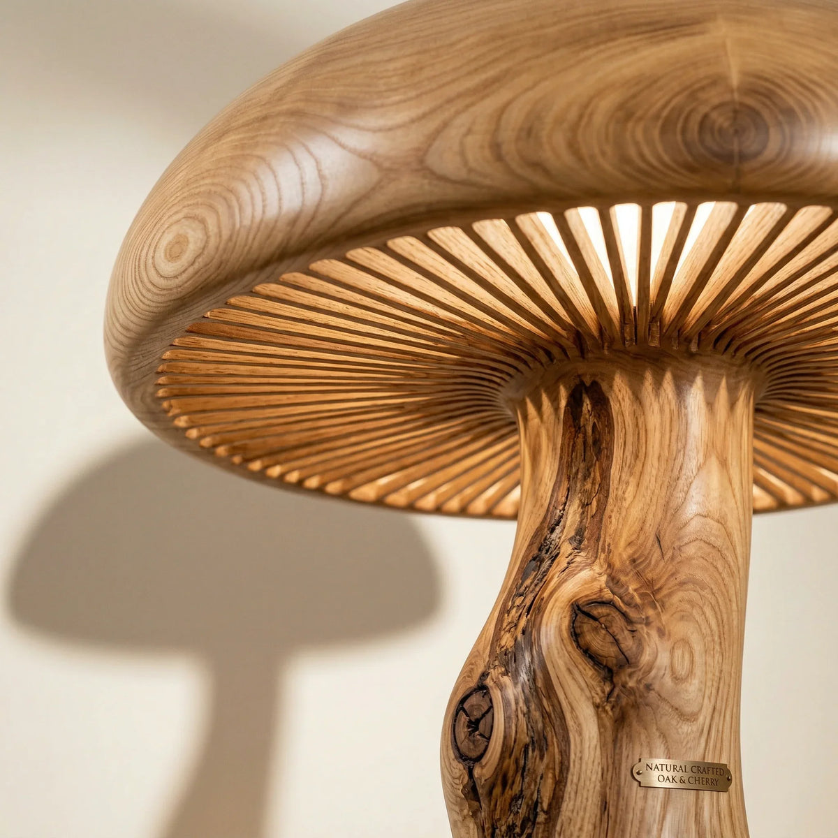 Solid wood mushroom floor lamp with sculpted log stem and illuminated wide cap