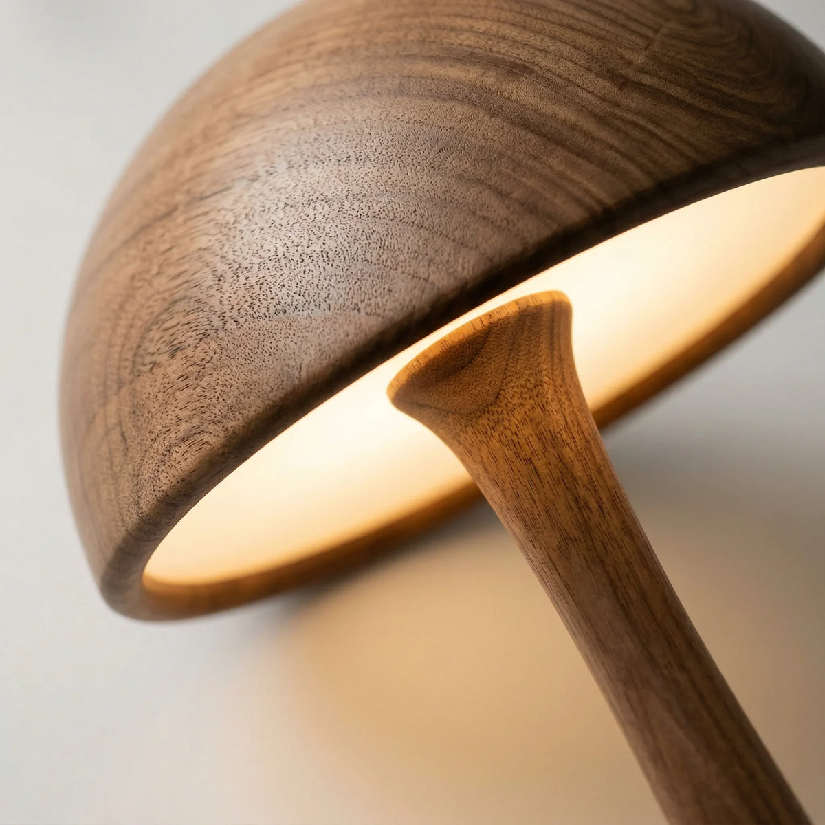 Solid wood mushroom floor lamp with glowing dome cap and tapered stem, modern design