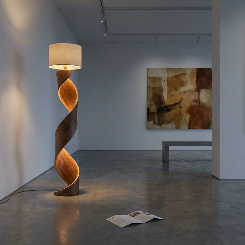 Twisted ribbon wood floor lamp with fabric shade in a modern minimalist room