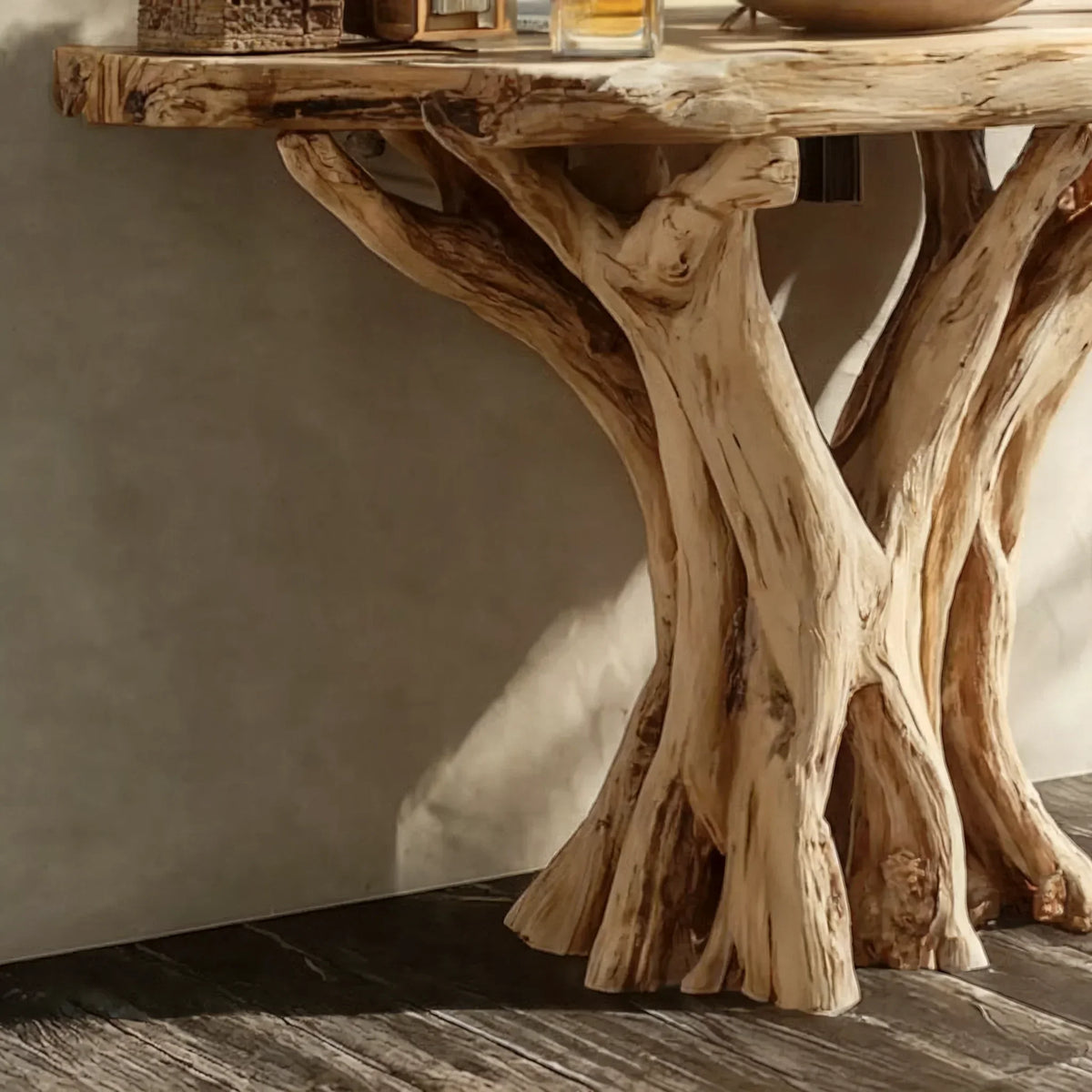 Close-up of a live edge wood console table with natural tree branch base