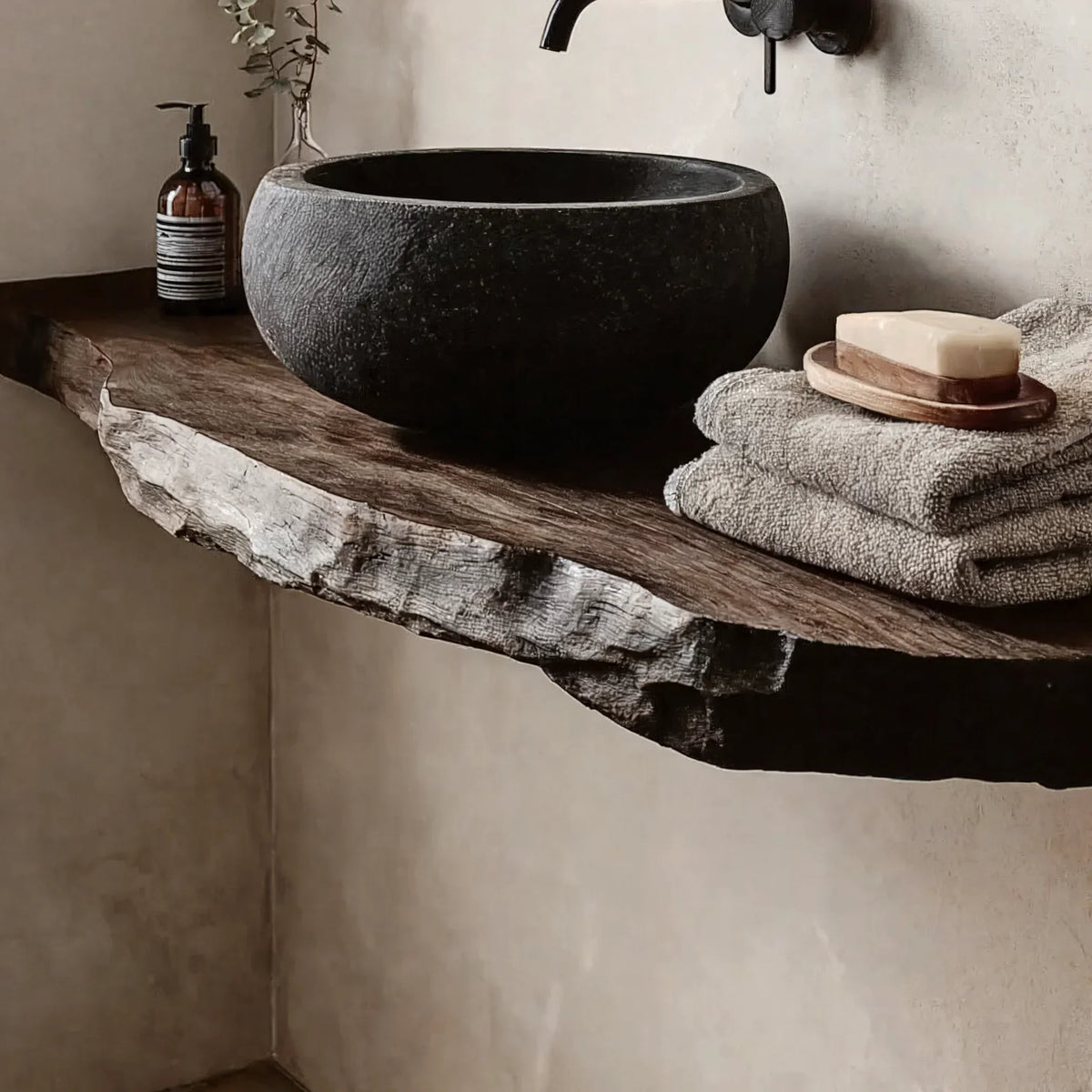 Minimalist bathroom vanity with live edge wood shelf and stone vessel sink