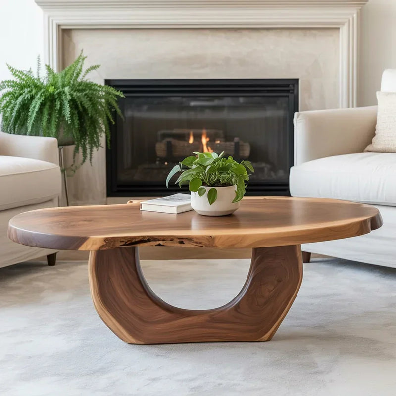 Modern living room with a live edge wood coffee table, white sofas, fireplace, and indoor plants.