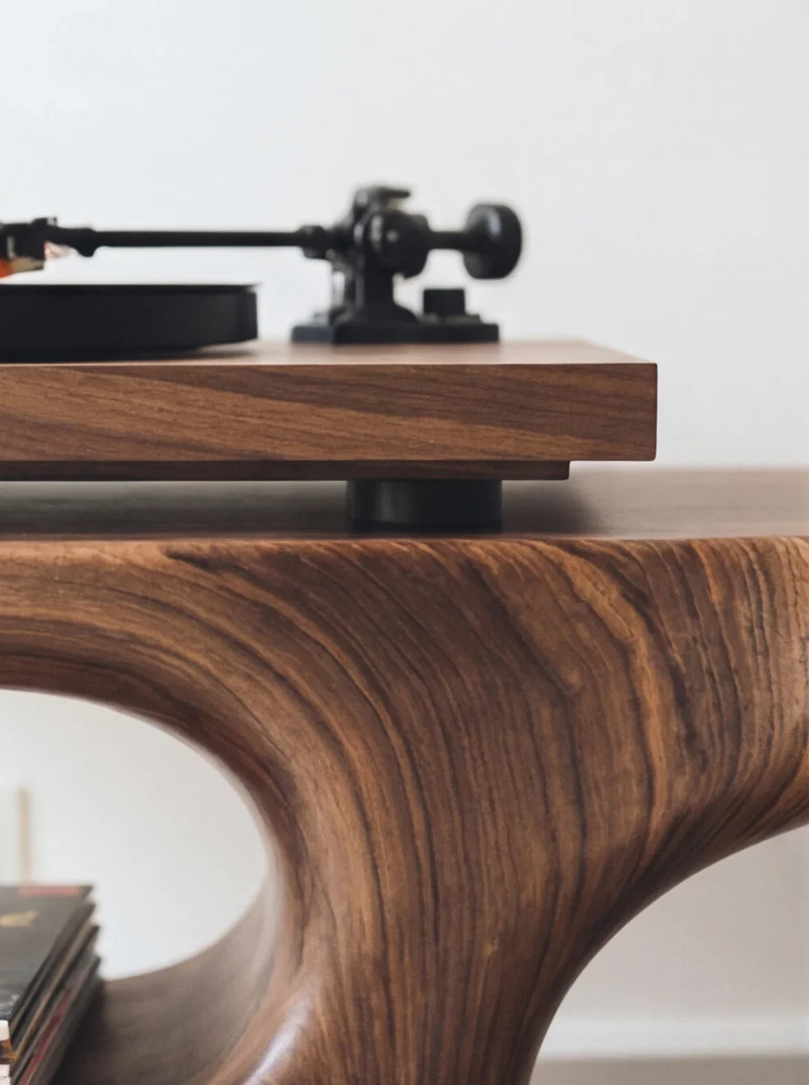 Sustainably crafted live edge solid wood table with record player and organic curves