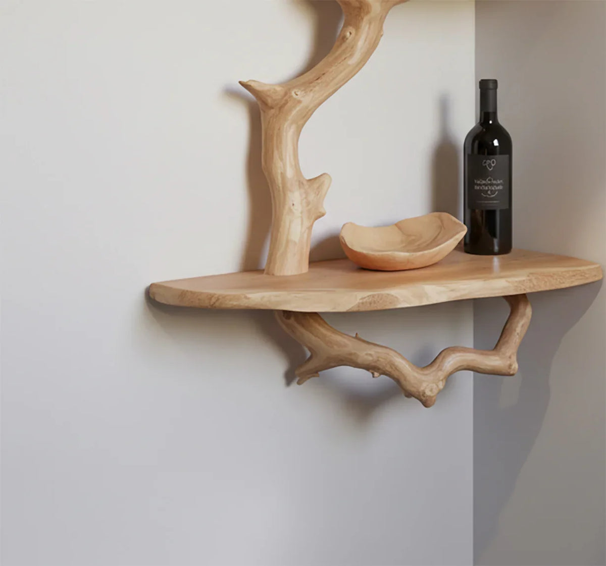 Live edge wooden corner shelf with tree branch supports, bowl, and wine bottle display
