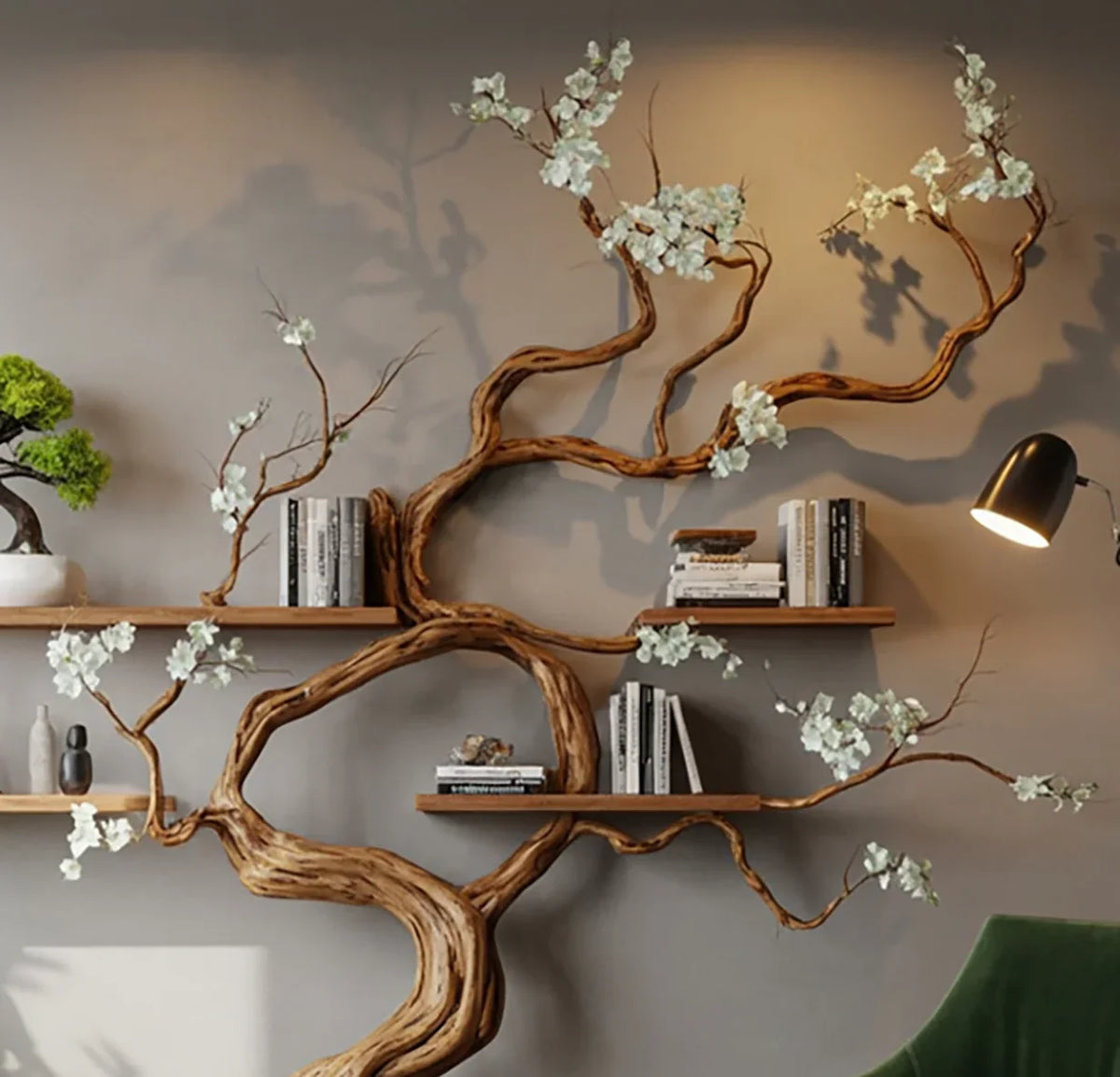 Live edge tree bookshelf with flowers, floating wooden shelves and books on gray wall