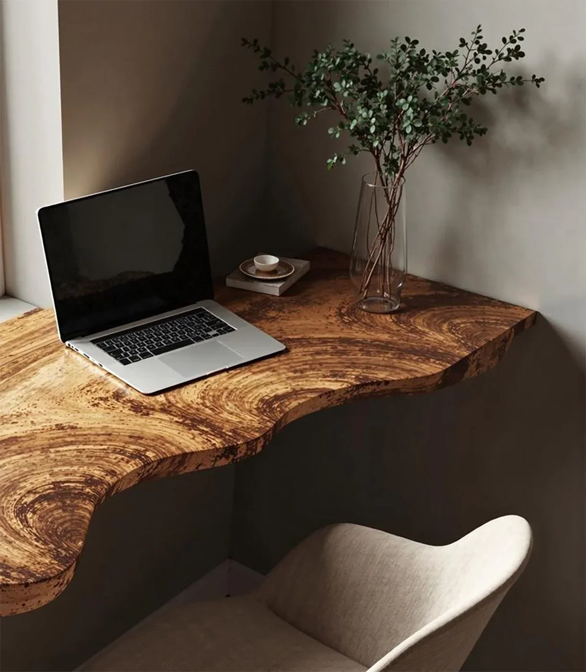 Live edge solid wood floating desk with laptop, minimalist chair, and plant decor, common mistakes building desk with floating shelves installation errors