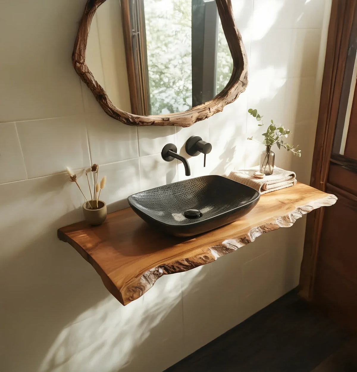 Live edge wood bathroom vanity with black vessel sink and rustic mirror, modern decor.