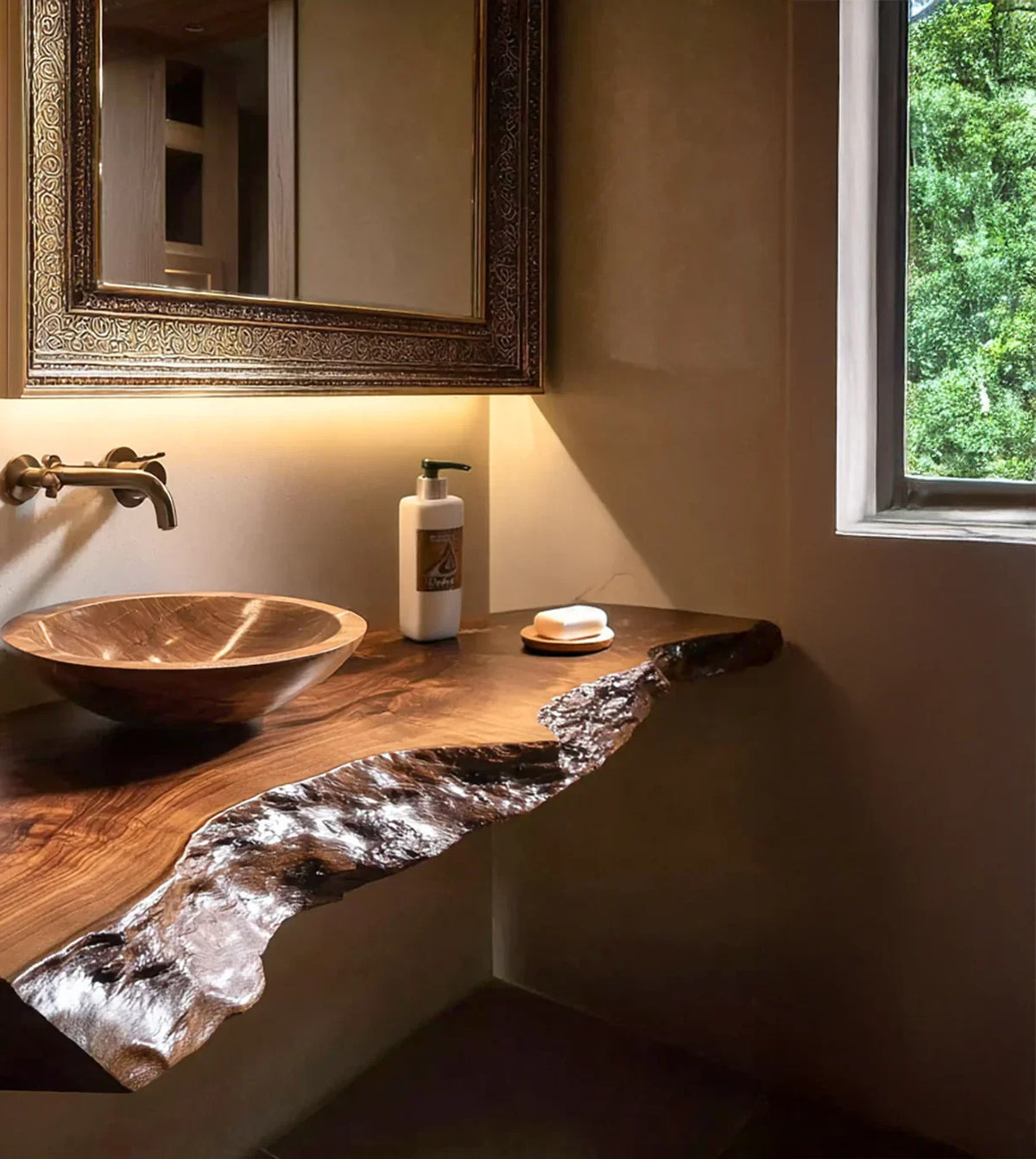 Rustic bathroom with live edge wooden countertop, round wooden sink, ornate mirror, and natural light