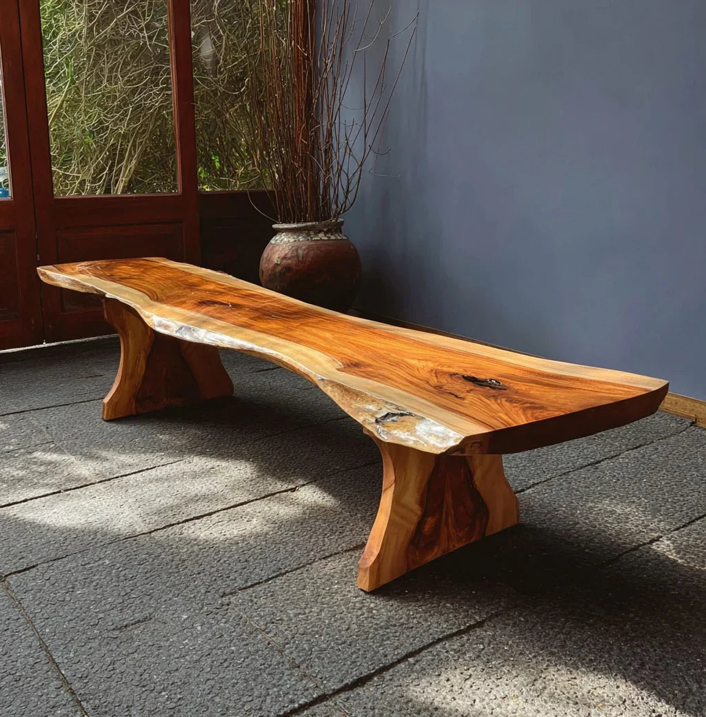 Live edge solid wood table with a natural finish in a sunlit modern room