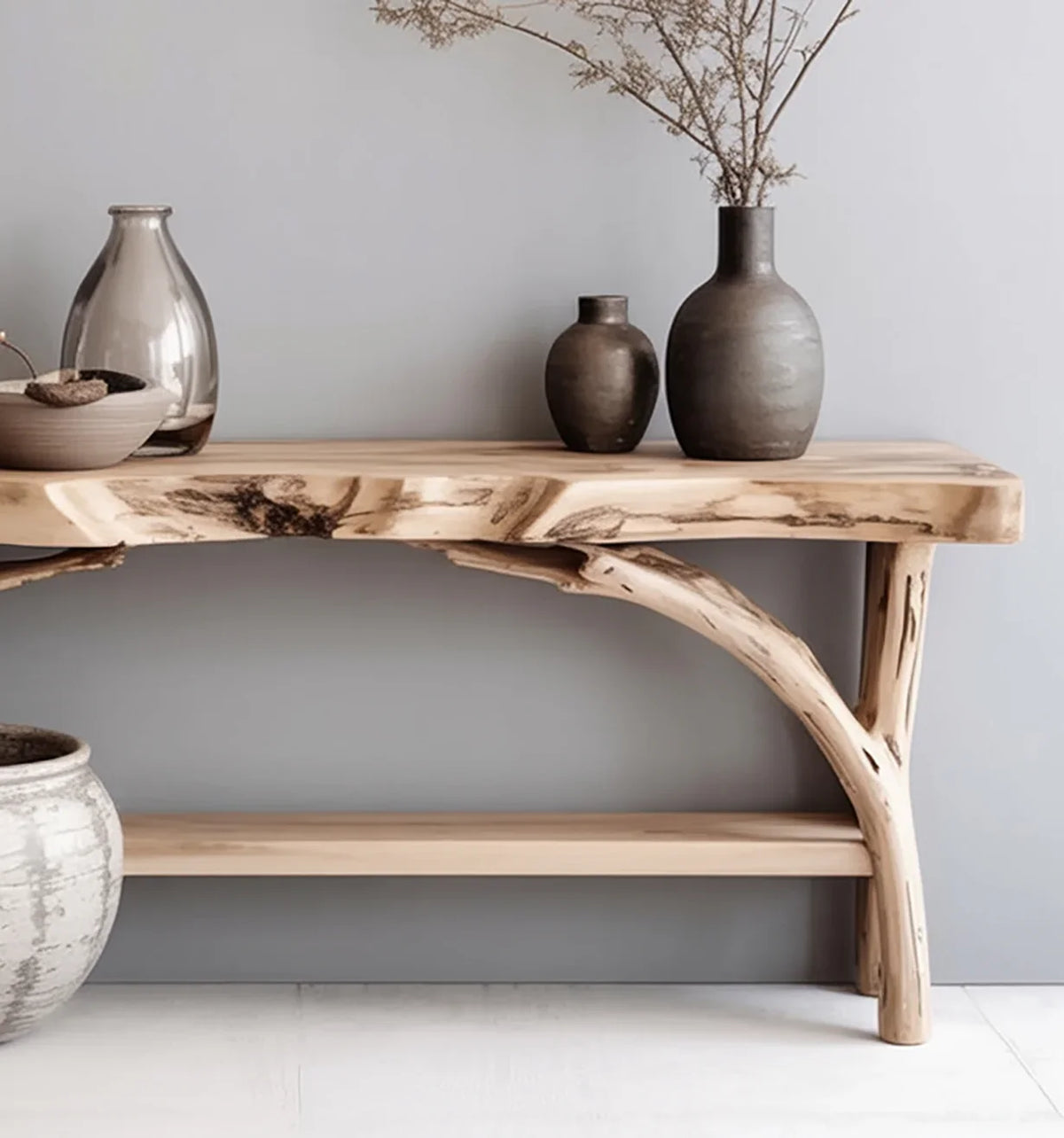 Sustainably crafted live edge wood console table with vases and minimalist decor