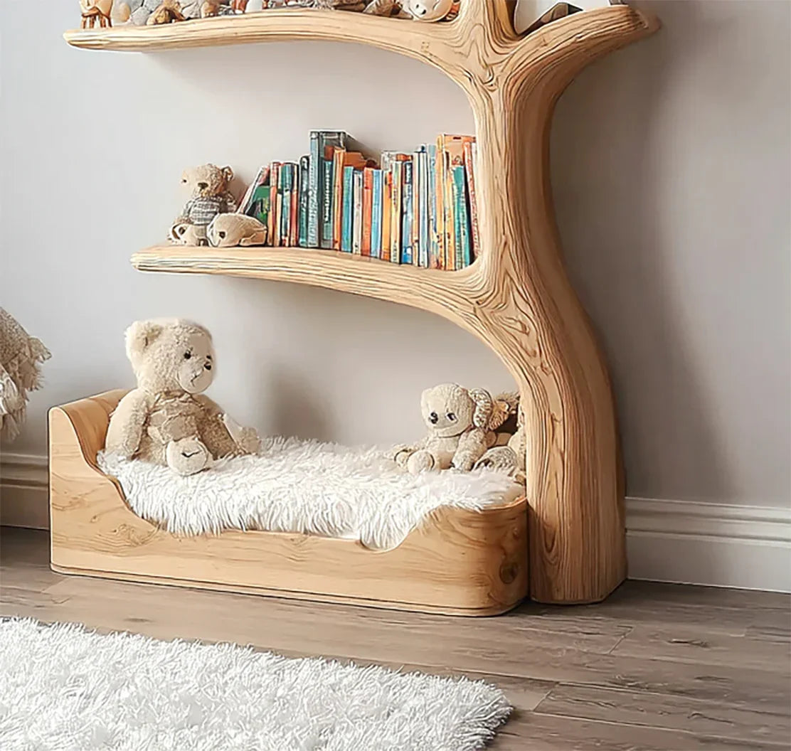 Wooden tree-shaped bookshelf with colorful books and plush teddy bears on a small bed in kids' room