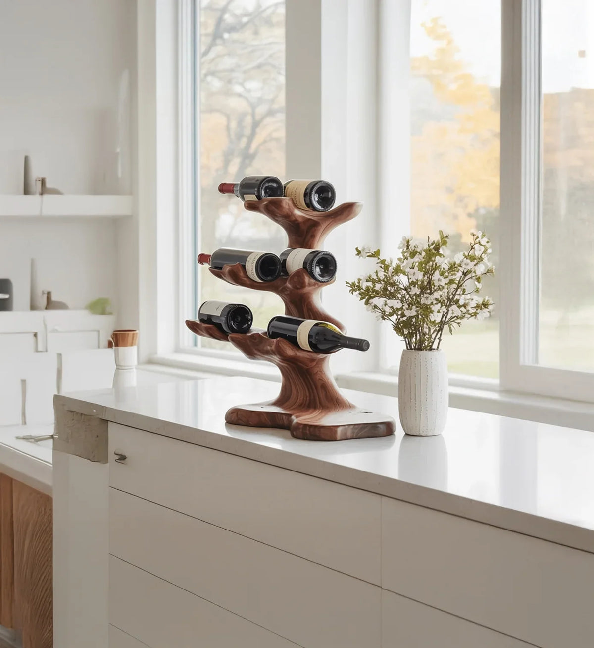 Sculpted solid wood wine rack shaped like a tree on a modern kitchen counter