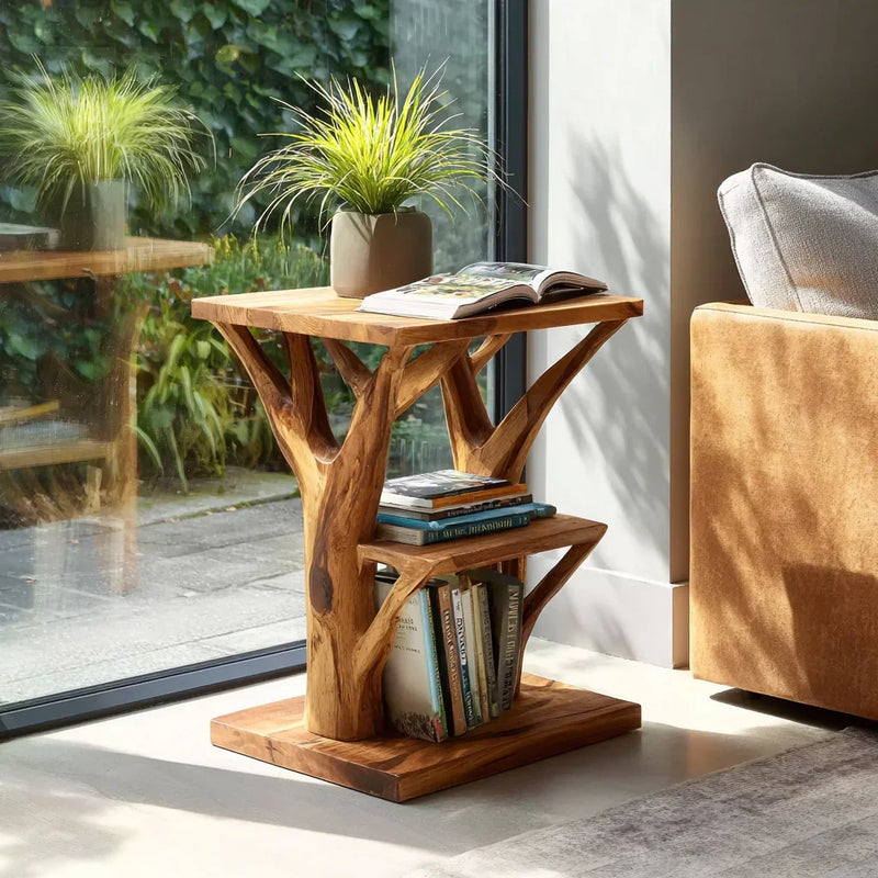 Solid wood live edge tree bookshelf side table with books and plant near window