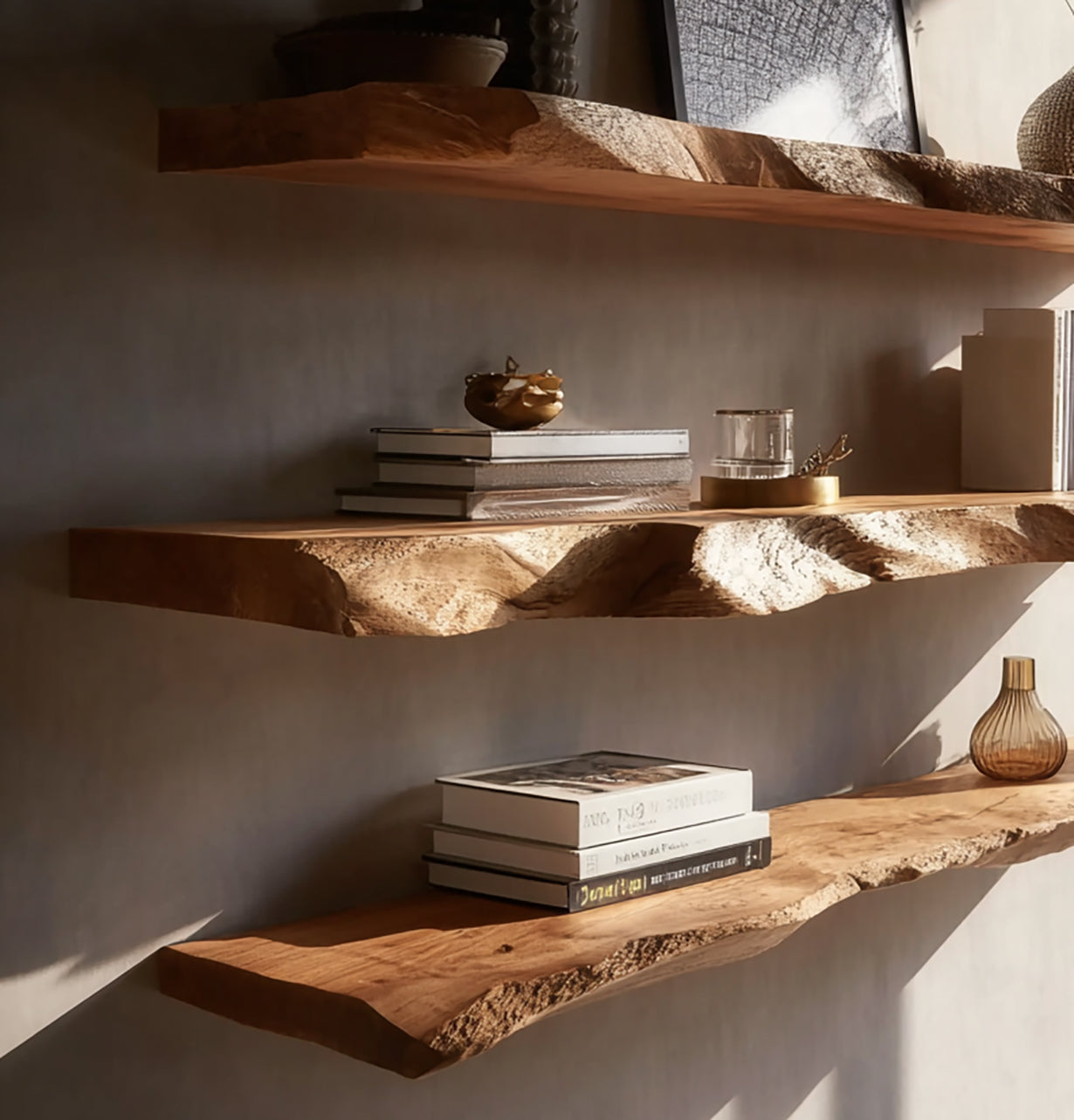 Floating rustic wooden shelves with books, glass jar, decorative objects, and warm natural light