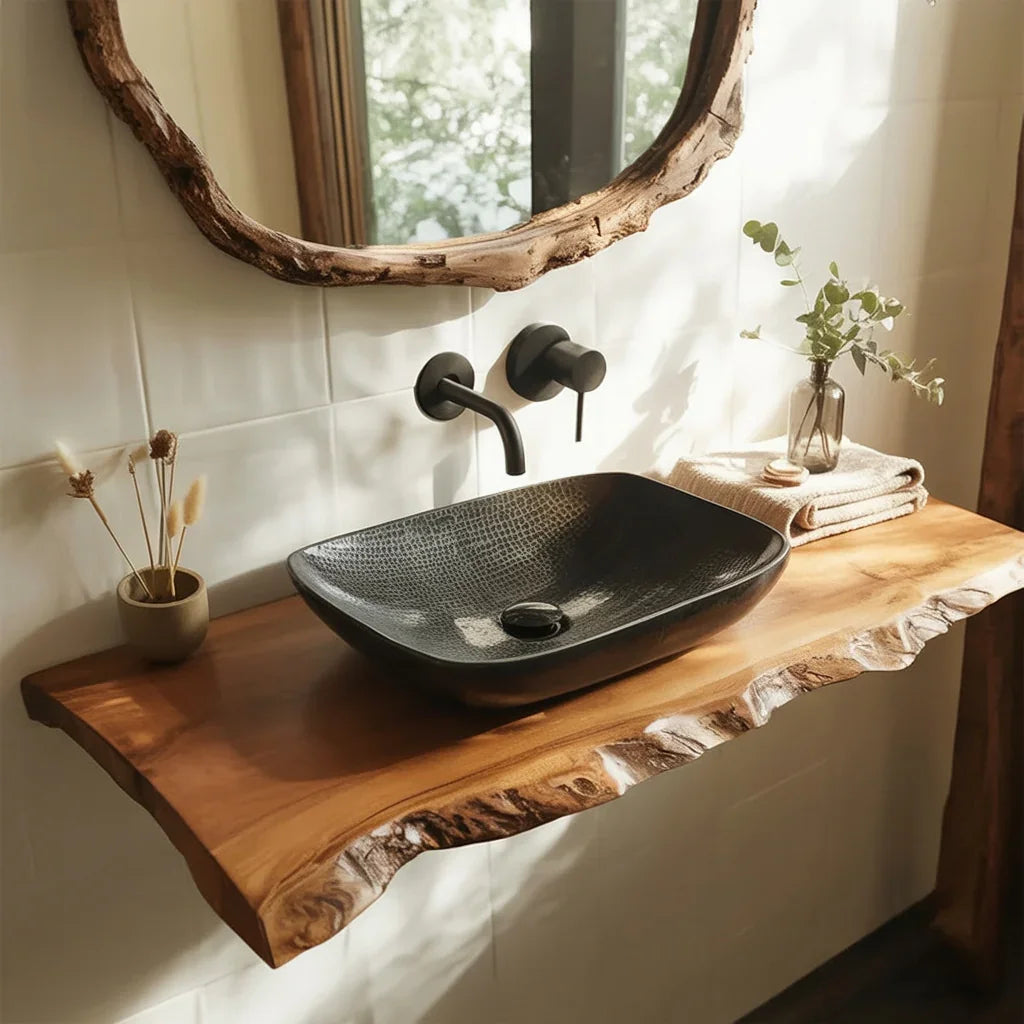 Live edge wood bathroom vanity with a black vessel sink and modern wall-mounted faucet