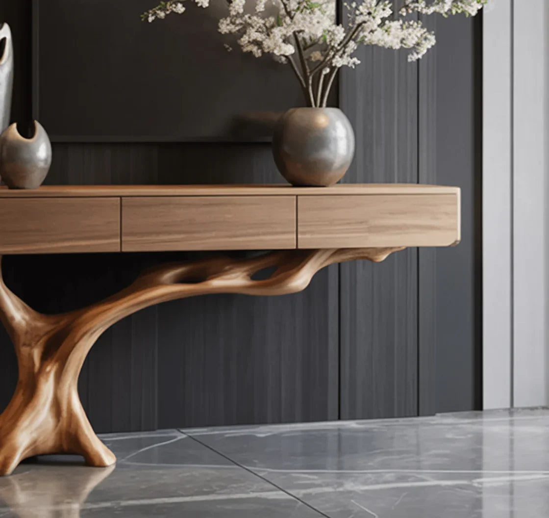 Live edge wood console table with tree branch base, modern decor, vases, and flowers