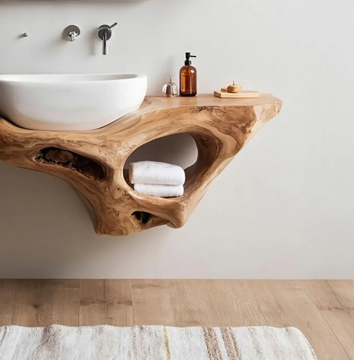 Live edge solid wood bathroom vanity with vessel sink, natural finish, and towel storage