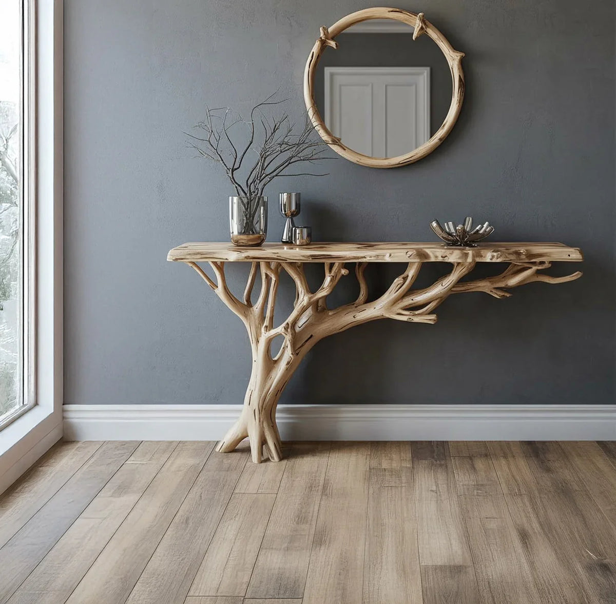 Live edge console table with tree branch base, round wood mirror, and minimalist decor
