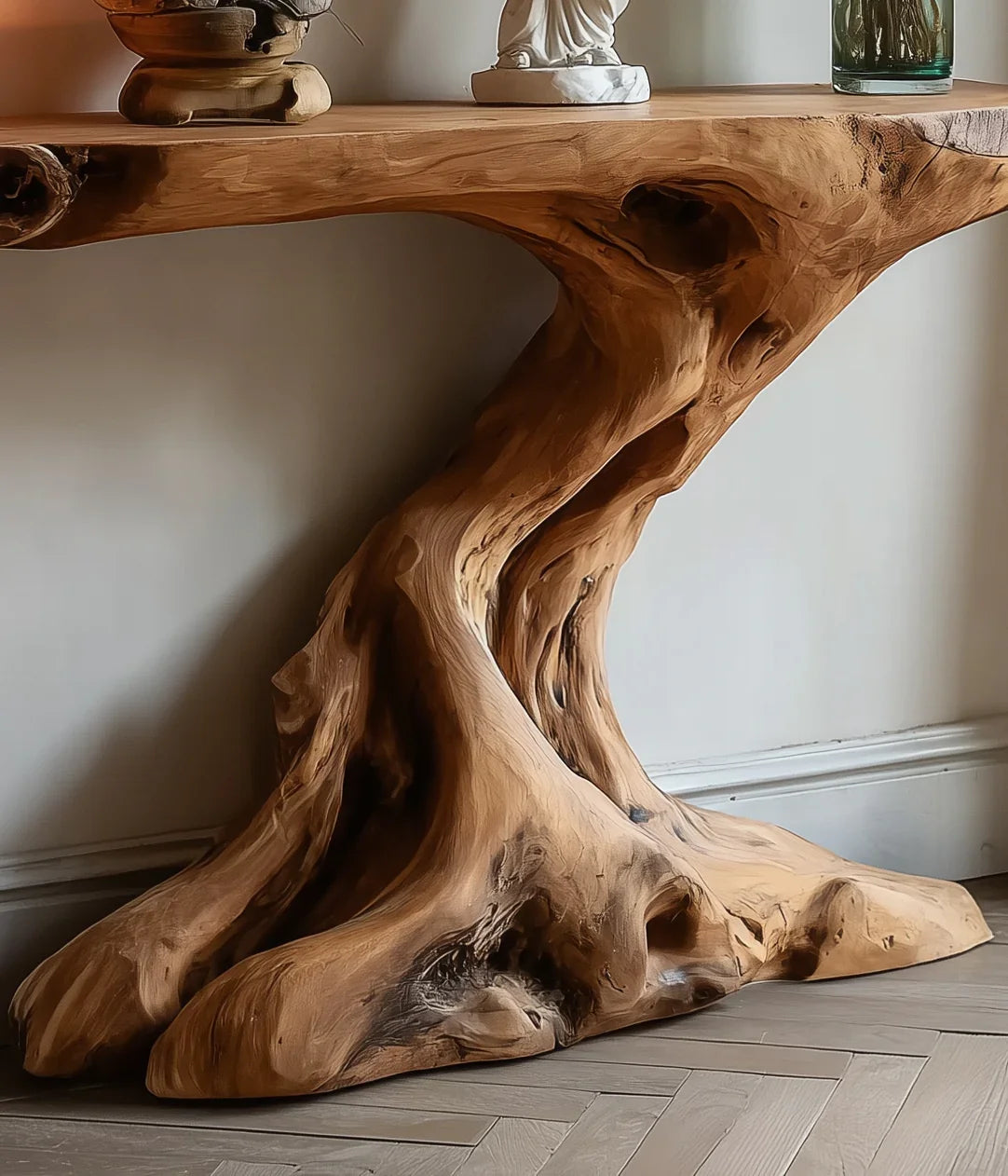 Live edge solid wood console table with sculpted organic tree base in modern interior