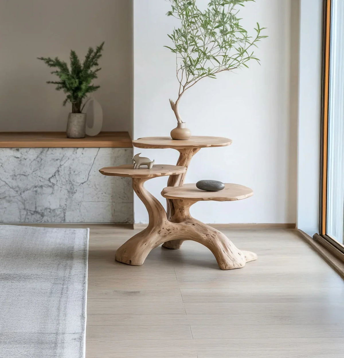 Live edge solid wood sculptural side table with decor in a modern minimalist room