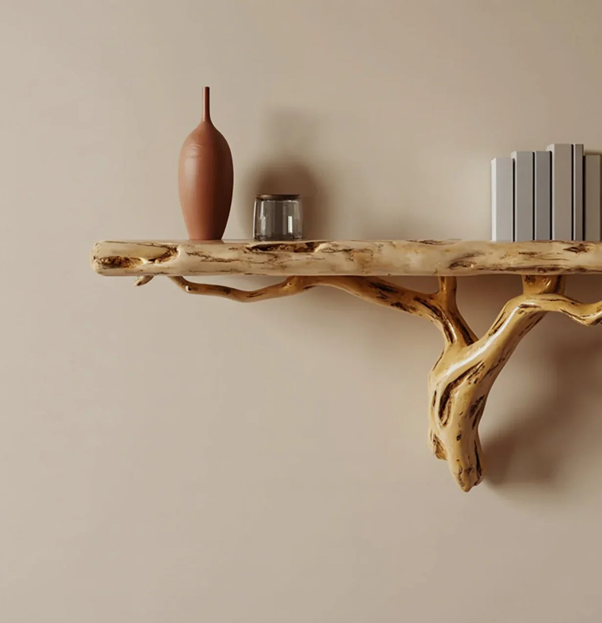 Live edge wooden floating shelf with decorative vase, glass jar, and books against beige wall.