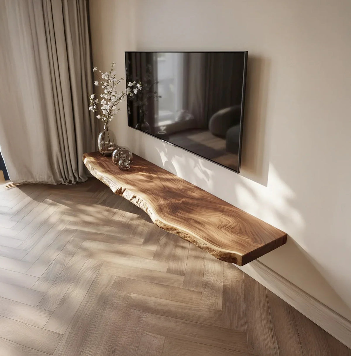 Live edge solid wood floating shelf below wall-mounted TV in modern living room
