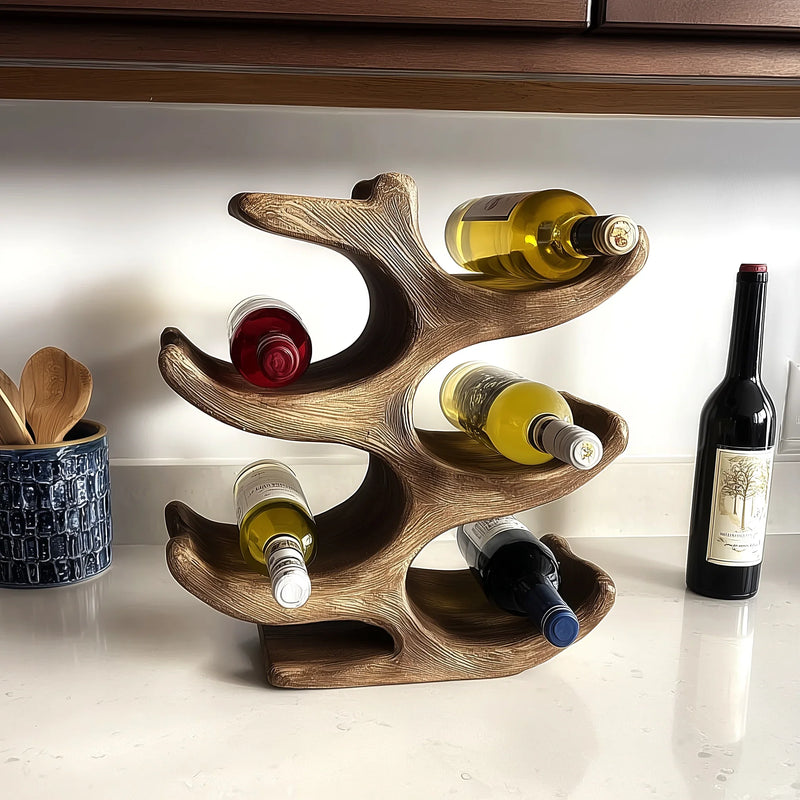 Live edge solid wood wine rack holding assorted wine bottles on a modern kitchen counter.