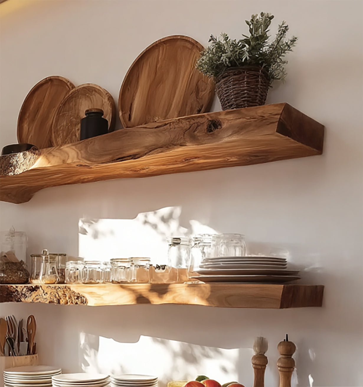 Rustic wooden floating shelves with plates, glass jars, cutting boards, and a potted plant in kitchen