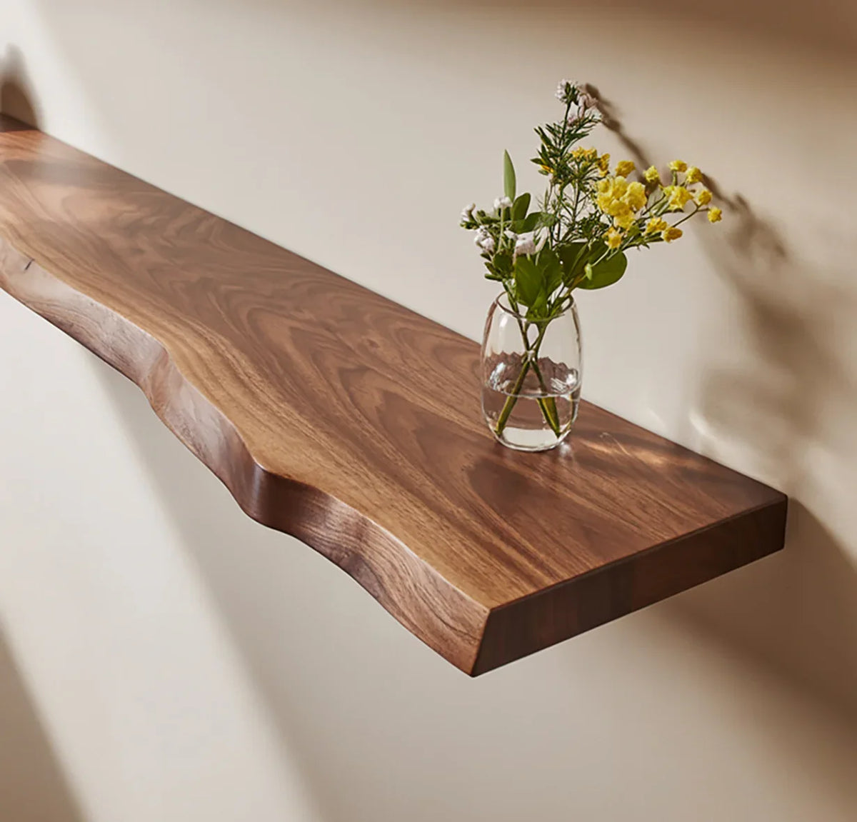 Solid wood live edge floating shelf with glass vase and fresh flowers