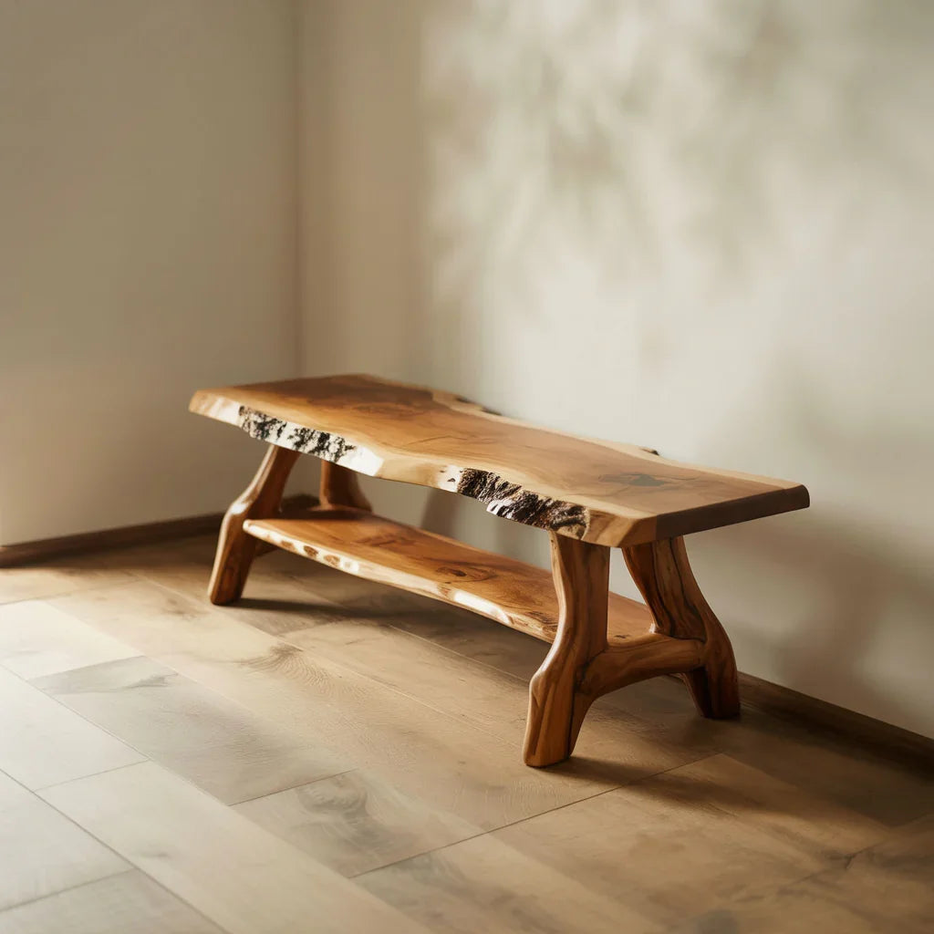 Solid wood live edge bench with lower shelf in a sunlit room on hardwood floors