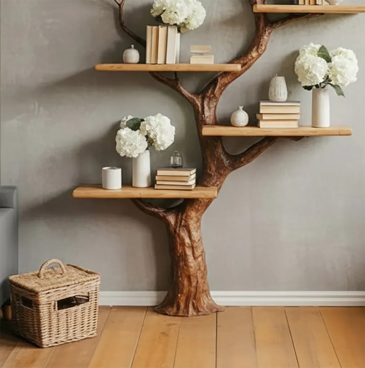 Tree-shaped bookshelf with solid wood shelves, decorated with books and white flowers in vases