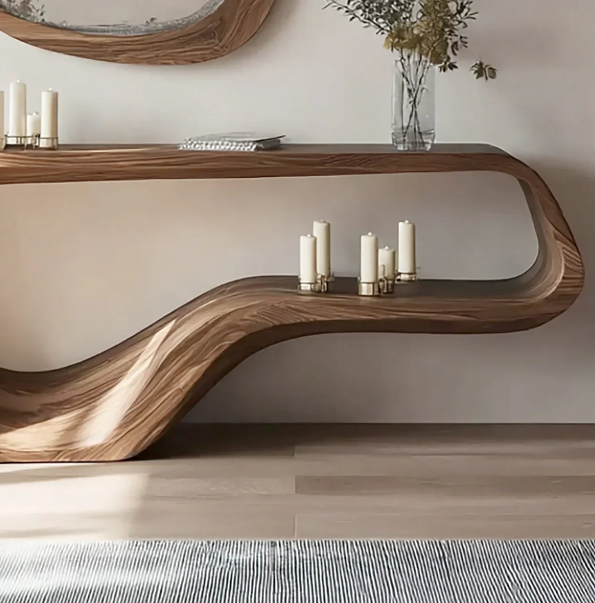 Modern live edge wooden console table with organic curves, candles, and glass vase decor