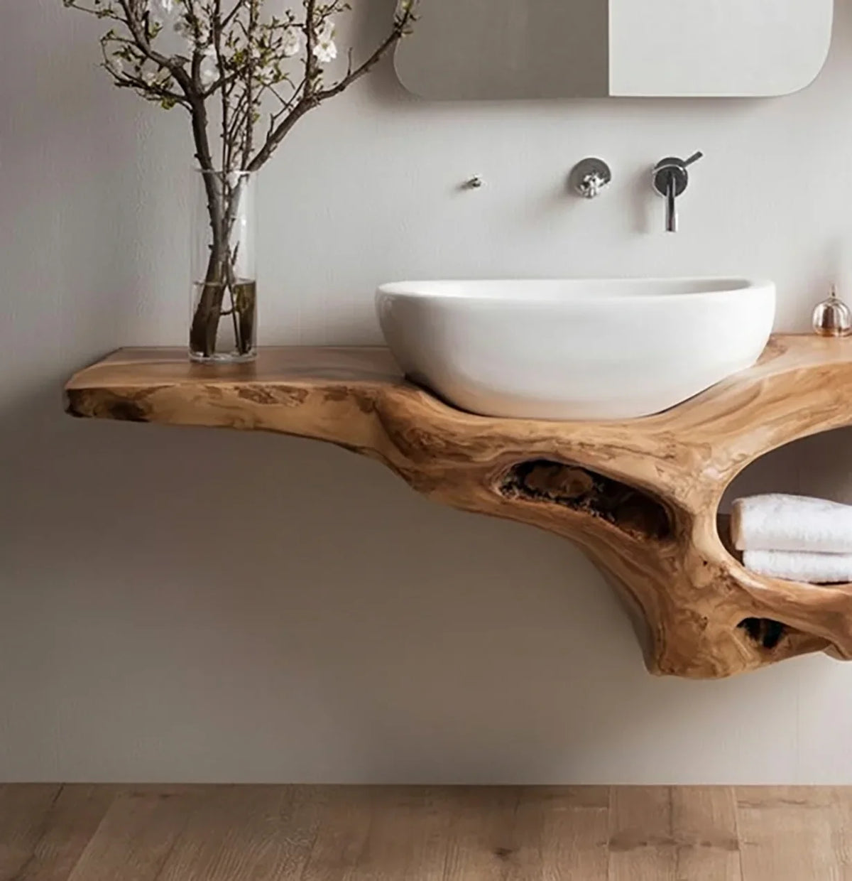 Live edge solid wood floating vanity with vessel sink and towel storage in modern bathroom