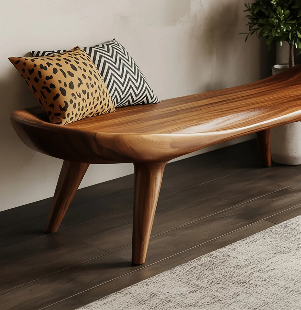 Solid wood bench with live edge finish, paired with leopard and chevron accent pillows