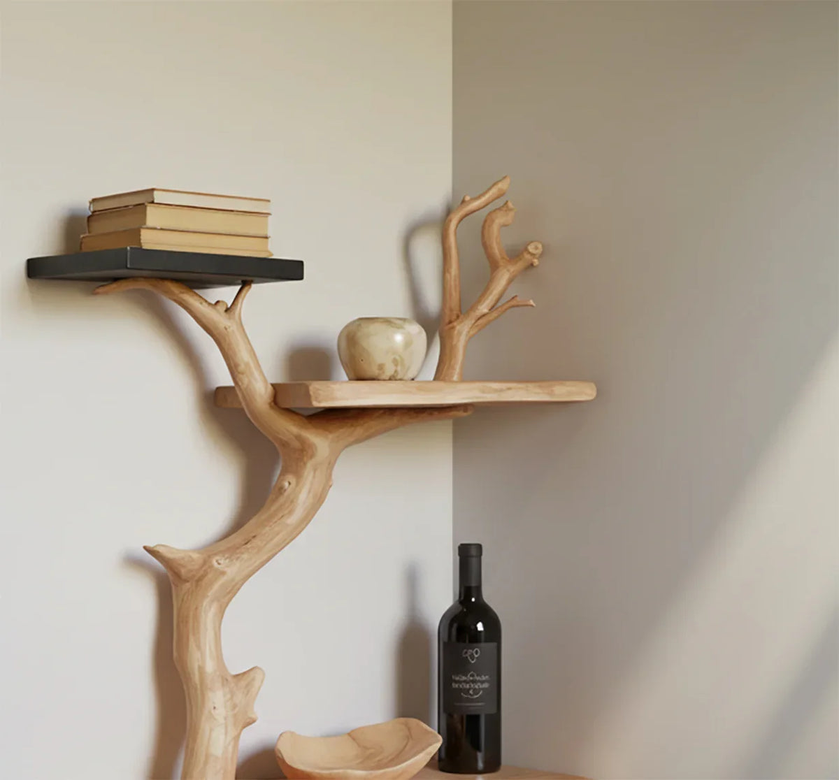Live edge solid wood tree bookshelf with books, vase, and wine bottle on shelves
