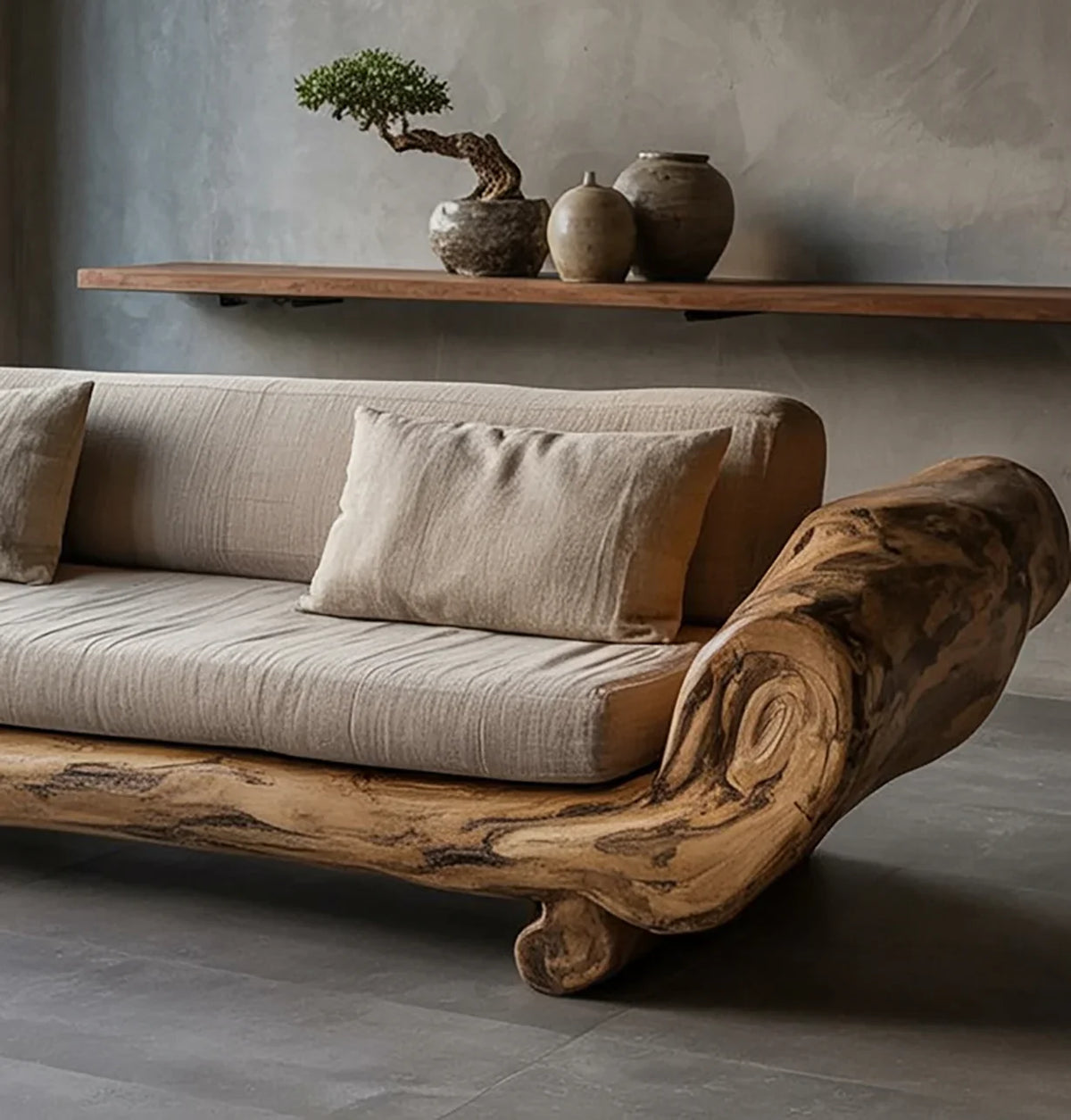 Modern beige sofa with natural wooden frame and neutral cushions in minimalist living room