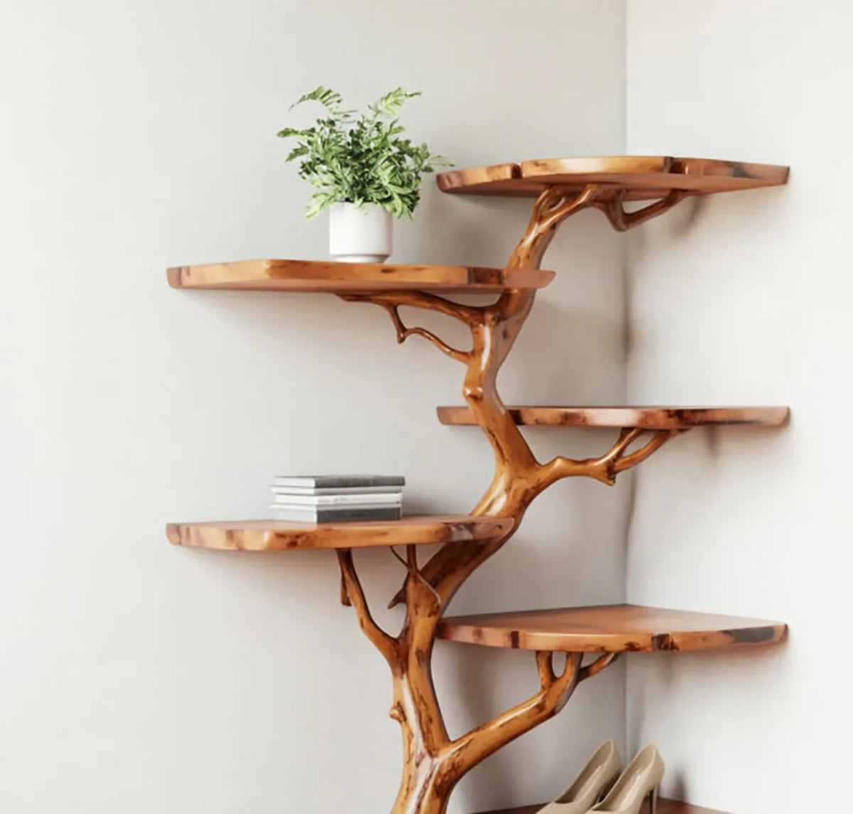 Live edge solid wood tree bookshelf with floating shelves, potted plant, and books