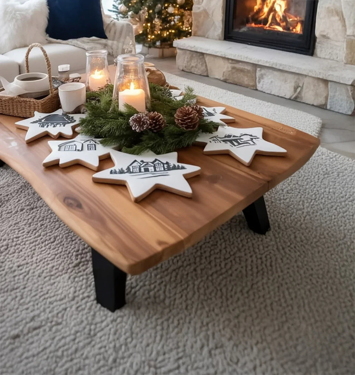 Cozy living room with wooden coffee table, star-shaped Christmas cookies, candles, pinecones, and a fireplace