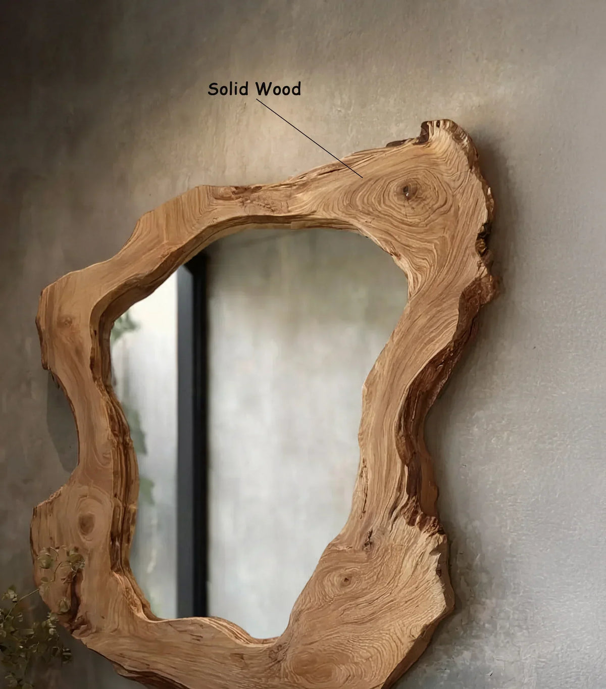 Organic live edge solid wood mirror frame on textured wall, natural wood grain visible