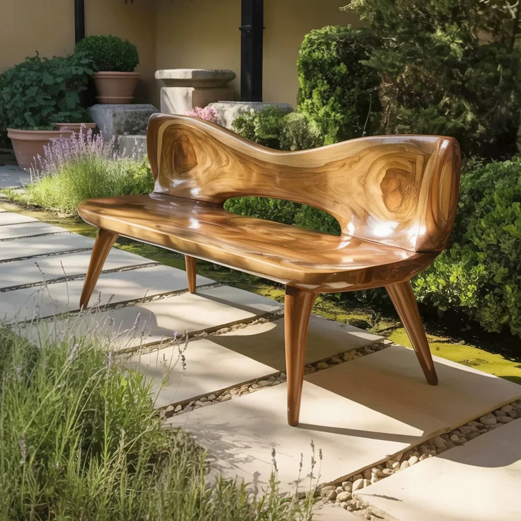 Solid wood live edge bench with sculpted backrest on garden stone path, modern outdoor furniture