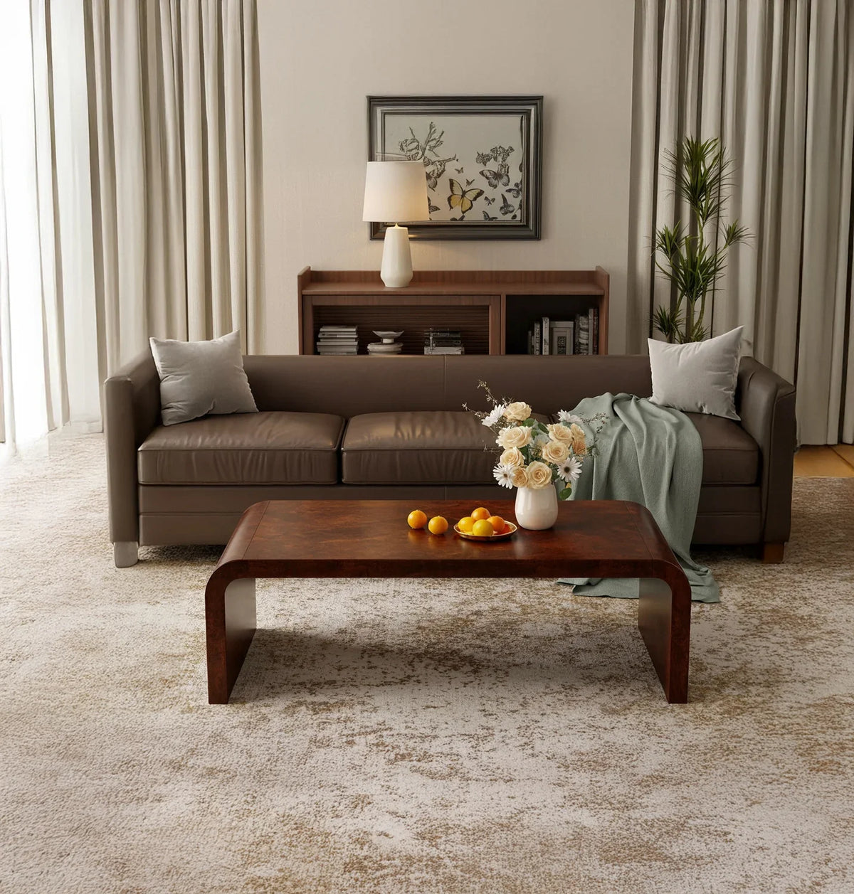 Modern living room with brown leather sofa, wooden coffee table, vase of flowers, and potted plant