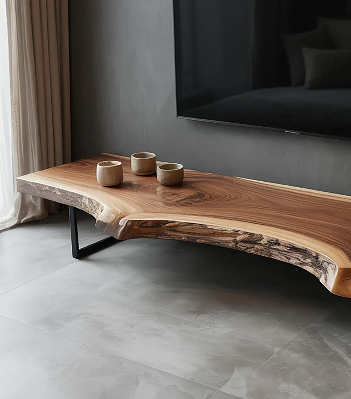 Live edge wood TV stand with natural grain and three ceramic cups in modern living room