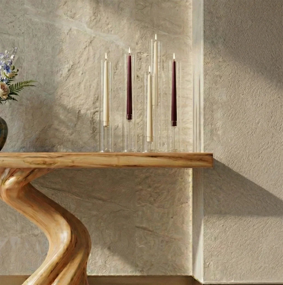 Live edge solid wood console table with twisted base, glass candle holders, and textured wall
