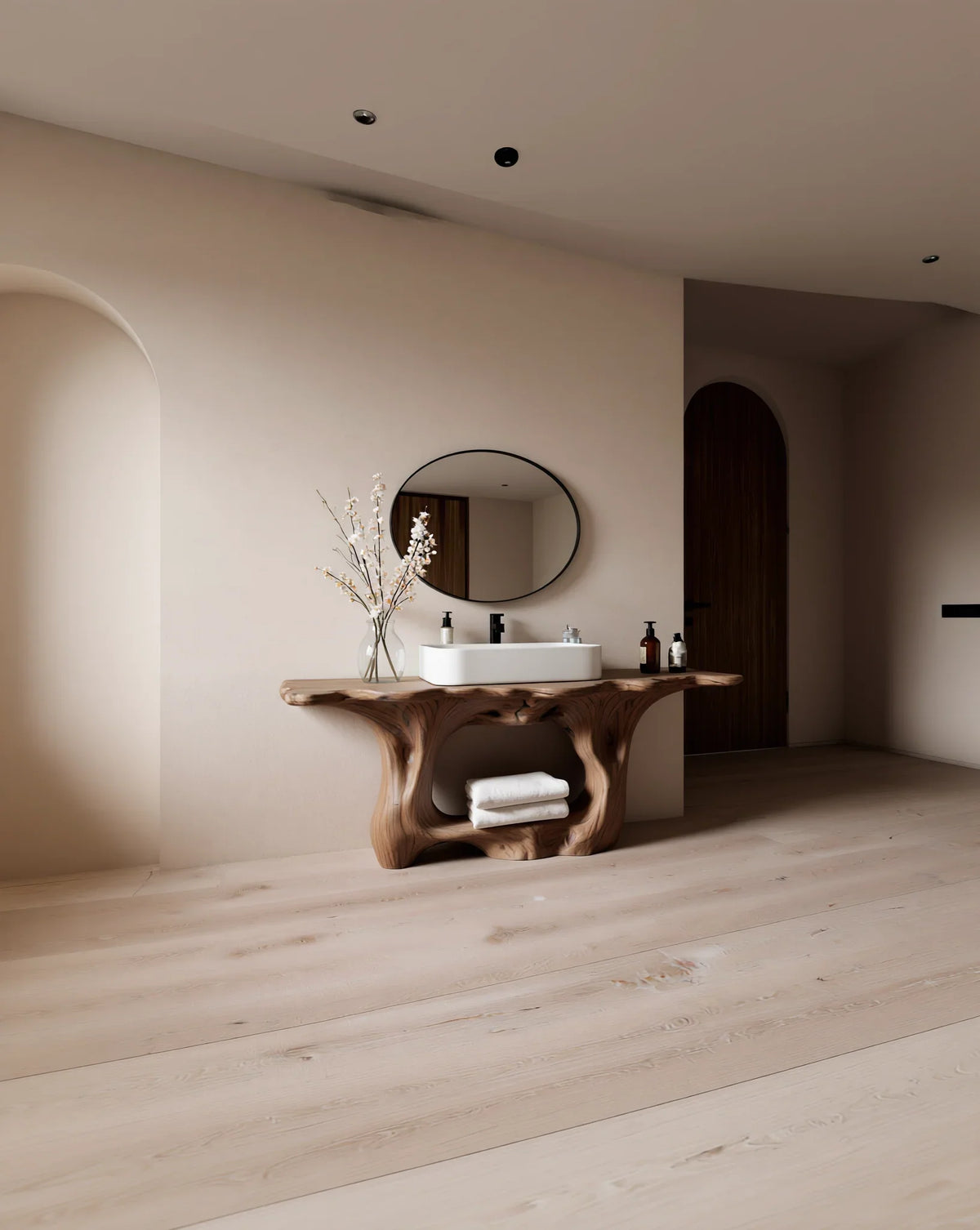 Modern bathroom with live edge wood vanity, round mirror, and vessel sink on light wood floor