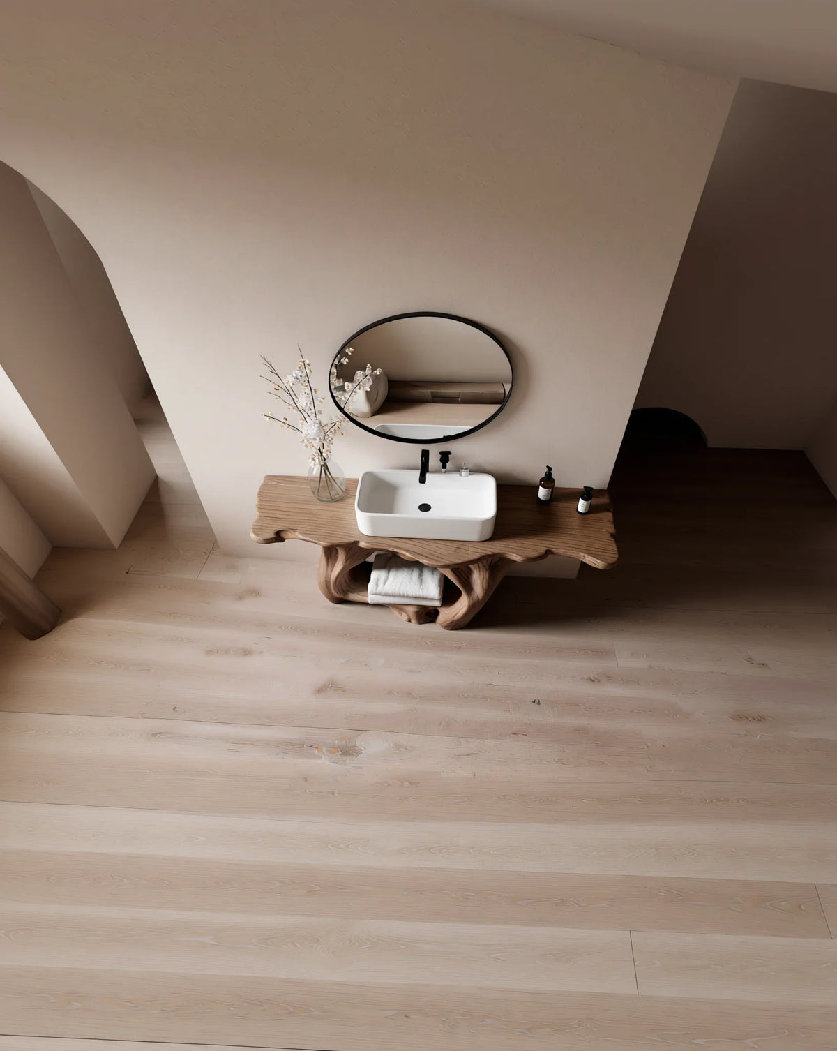 Modern bathroom with a live edge wood vanity, round mirror, and square sink