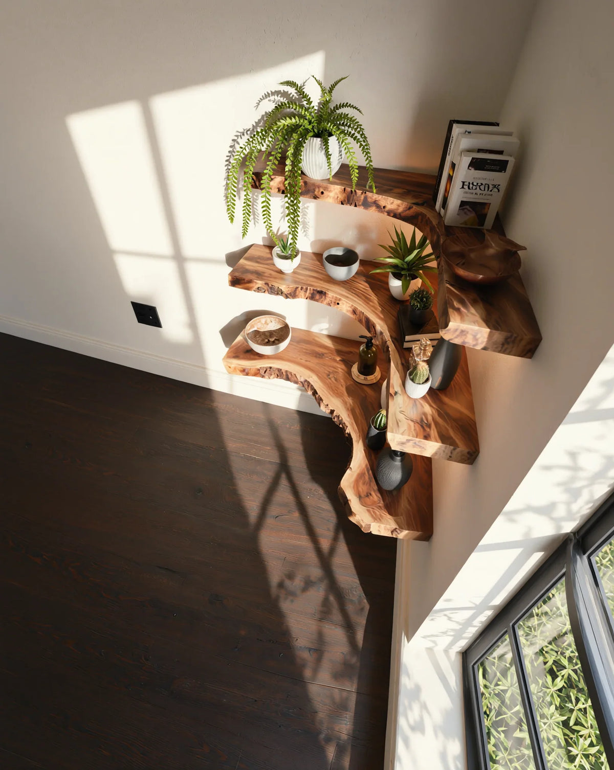 Live edge solid wood floating shelves with plants, books, and decor in a sunlit corner.