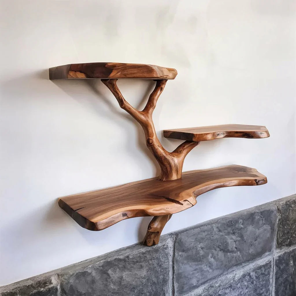 Live edge solid wood tree bookshelf with natural branches mounted on wall above stone tiles