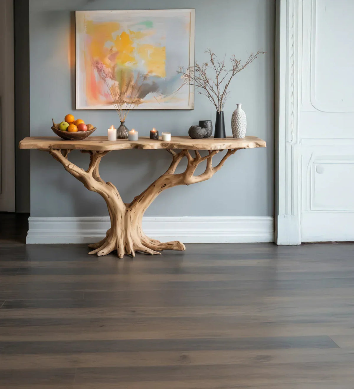 Live edge solid wood tree console table with natural decor and abstract art in modern room
